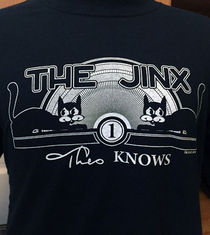 Theo Knows… The Jinx T-Shirt (Joe Silkie)